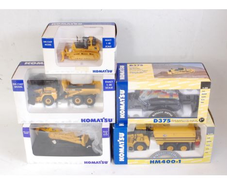 A Komatsu 1:50 scale boxed diecast group, mixed manufacturers to include Universal Hobbies, Joal, and First Gear, examples to