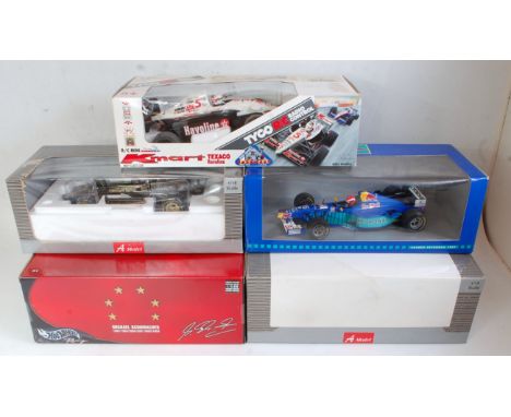 Five various boxed 1:18 scale diecast and radio controlled Formula One cars to include a Classic A Models Lotus 72D JPS, a Cl