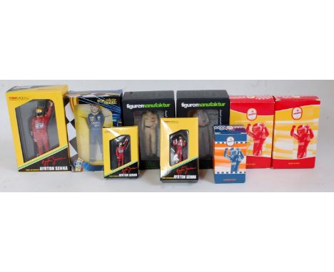 Eight various boxed 1:18 and 1:43 scale boxed F1 resin and plastic drivers to include a Truescale Models Ayrton Senna, a VF d