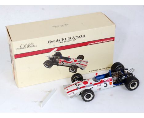 An Ebbro Premium Collection 1:20 scale model of a Honda F1 RA 301 racing car, 1968 Mexico Grand Prix racing example, appears 