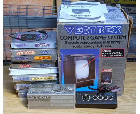 A Vectres computer gaming system, sold with a quantity of mixed cassette style games, examples to include Scramble, Clean Swe