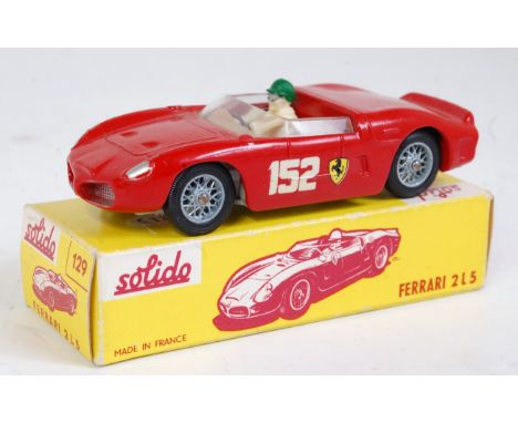 A Solido No. 129 Ferrari 2L5 racing car comprising red body with brown interior and wirework hubs with racing No. 152 and dri