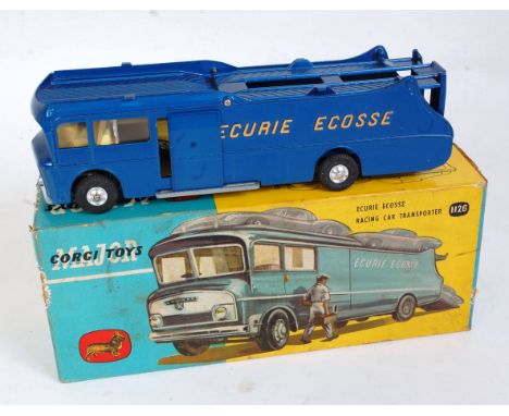 A Corgi Toys No. 1126 Ecurie Ecosse racing car transporter comprising of dark metallic blue body with yellow lettering and ye