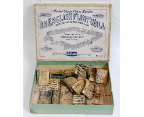 A Britains Home Farm No. 21F an English Old Flint Wall garden set, comprising of various flint wall sections with tryst gate,