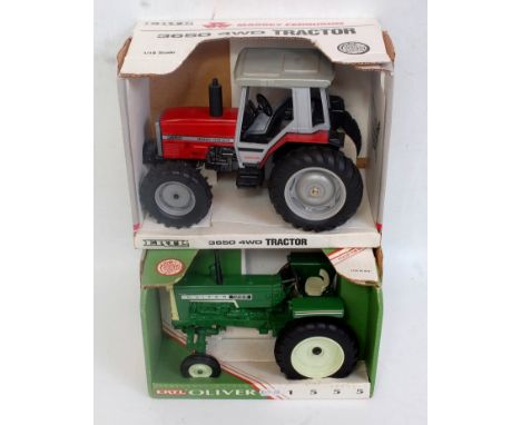 An Ertl boxed 1:16 scale farming diecast group to include an Oliver 1555 tractor, together with a Massey Ferguson 3650 Four-w