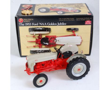 An Ertl Precision Series 1:16 scale model of a 1953 Ford Golden Jubilee tractor, model No. 355, comprising grey and red body 