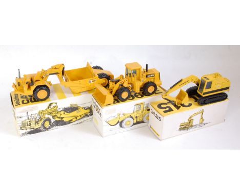 An NZG boxed 1:50 scale Caterpillar construction diecast group to include a No. 122 Caterpillar 621 wheel tractor scraper, a 