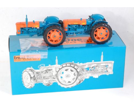 A Universal Hobbies 1:16 scale model of a Fordson Doe Triple D tractor, model No. 2637A comprising blue and orange body with 