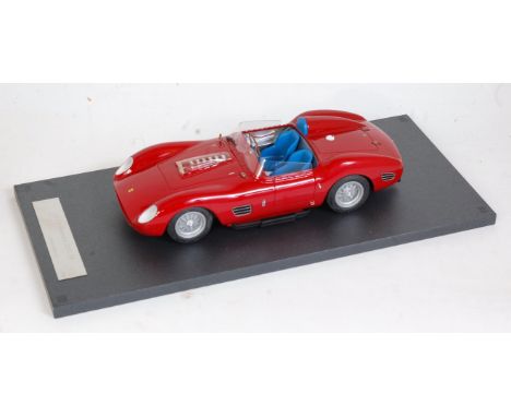 A TRL Models ? 1:18 scale resin and diecast model of a Ferrari 250TR finished in red with silver interior and blue seats, sol