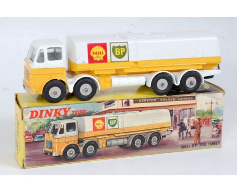 A Dinky Toys No. 944 Shell BP fuel tanker comprising white and yellow body with grey hubs with Shell BP stickers, sold in the