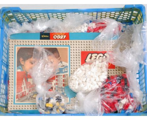 A Lego System No. 700/3 boxed set comprising of various components, trees, cars, and telegraph poles, also sold with a quanti