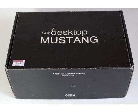 A 1:32 scale Japanese Fine Structure model white metal and brass kit to make a Mustang P51 desktop ornament, appears as issue