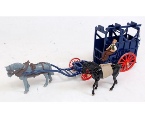 A Dorrie Collection 1:32 scale white metal and resin model of a horse-drawn horse transporter comprising dark blue body with 