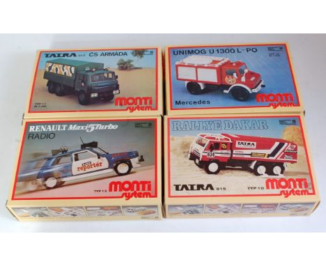 A Monti System of Czechoslovakia 1/48 scale plastic kit group to include a Rally Dakar 6-wheel racing lorry, Mercedes Unimog 