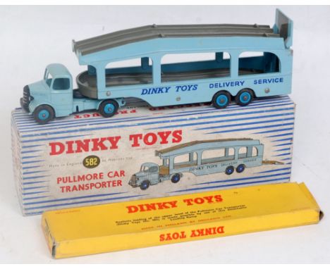 A Dinky Toys No. 582 Pullmore car transporter, comprising light blue cab and back with grey decks and dark blue hubs, six riv