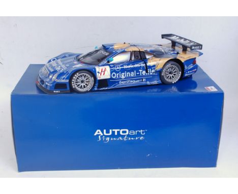 An Auto Art Signature Series 1:12 scale replica of a Mercedes Benz CLK GTR FIA GT1998 racing car, comprising blue & white det