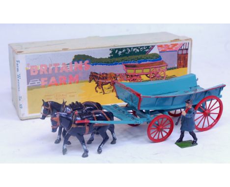 A Britains Farm Series boxed farming implement group to include No. 5F farm wagon comprising light blue body with red hubs an