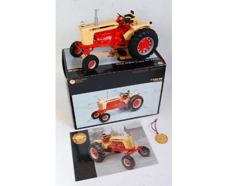 An Ertl Precision Series 1:16 scale model of a Case 930 Comfort King tractor, model No. 4284 comprising of cream and orange b