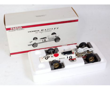 An Ebbro Premium Collection 1:20 scale model of a Honda RA 273 F1 racing car, 1966 Italian Grand Prix example, appears as iss