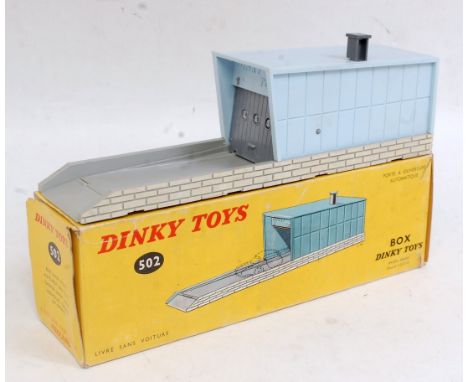 A French Dinky Toys No. 502 individual garage comprising grey and blue structure sold in the original all-card box (VG,BVG) w