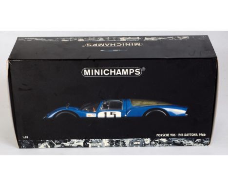 A Minichamps 1:18 scale model of a Porsche 906 24-hour Daytona 1966 racing car, comprising of blue &amp; grey body with racin