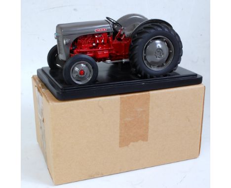 A Tractoys of France 1:16 scale model of a Ferguson FF30DS 1947 tractor, comprising grey and red body with grey hubs, in the 