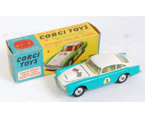 Corgi, 309 Aston Martin competition model, turquoise and white, lemon interior, flags on bonnet, RN3, spun hubs, yellow and b