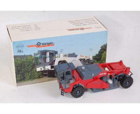 An NZG No.621 1:50 scale of a Wirtgen WR2000 recycler finished in red and grey with Kutter livery, housed in the original pol