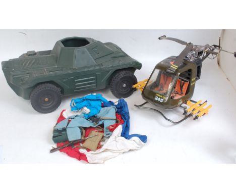 An Action Man Pallitoy four wheel Scout vehicle together with a bag of assorted Action Man clothing and accessories, also sol