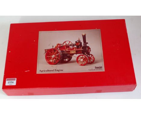 A Wills Finecast 3/8"-1" scale white metal kit for an agricultural traction engine, appears as issued in the original red gro