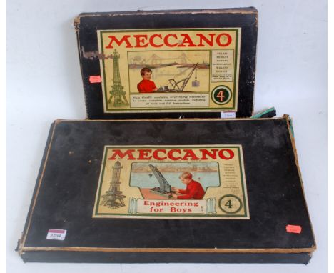 2 Meccano boxed sets, Contents unchecked for completeness but to include early enamel ships funnels, various brass cogs, and 