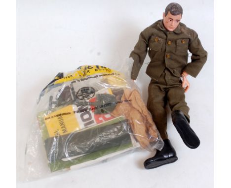 A vintage Pallitoy Action Man doll together with a quantity of various military Action Man equipment and leaflets