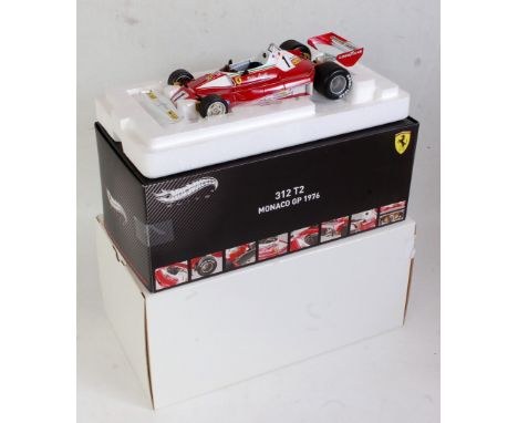 A Hot Wheels Elite 1:18 scale model of a Ferrari 312 T2 Monaco Grand Prix winner 1976, finished in red and white with racing 