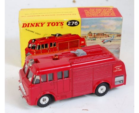 A Dinky Toys No. 276 airport fire tender, with flashing light, comprising red body, with spun hubs, bell and red roof light, 