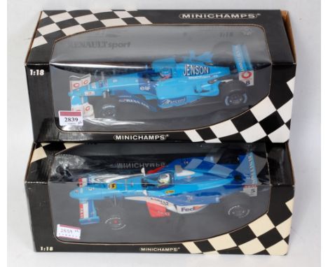 A Minichamps 1:18 scale boxed F1 racing diecast group to include a Jenson Button Benetton Renault Sport B201 racing car, toge