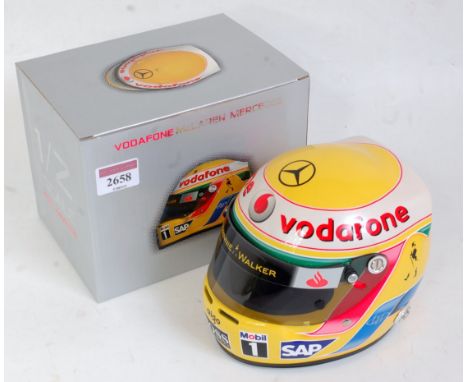 A KC Sports International 1:2 scale replica Lewis Hamilton Vodafone Maclaren Mercedes F1 racing helmet, appears as issued in 