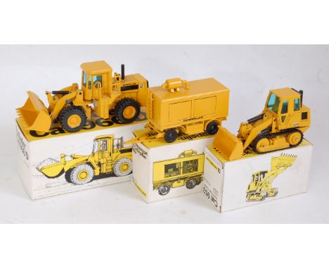 An NZG boxed 1:50 scale construction diecast group to include No. 237 Caterpillar 966 wheel type loader, No. 211 Caterpillar 