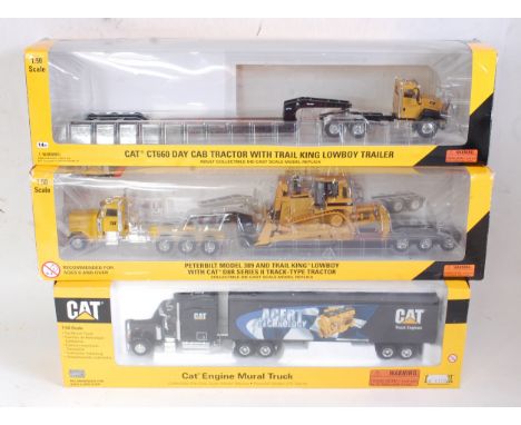 Seven various boxed Norscot 1:50 scale Caterpillar and other construction and transport vehicles to include a Kenworth W900 T