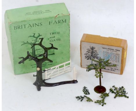 A Britains Farm Series No. 7F tree in gate, appears as issued in original all-card green and black line drawing box, together