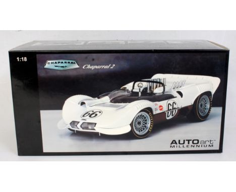 An Autoart Models 1:18 scale model of a Chaparal two sport racer 1965, racing No. 66 (closed box), model No. 86596, appears a