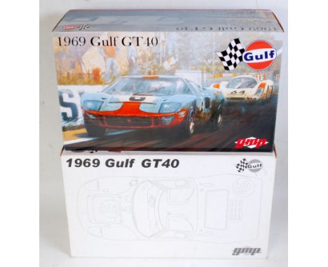 A GMP 1:12 scale No. 12073 model of a 1969 Gulf GT40 Mk1, comprising blue and orange body with racing No. 6, Jackie Hicks/Jac