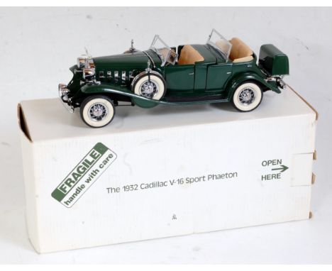 A Danbury Mint boxed 1:24 scale diecast group to include a 1932 Cadillac V16 sport Phaeton, together with a Duesenberg SS1 19