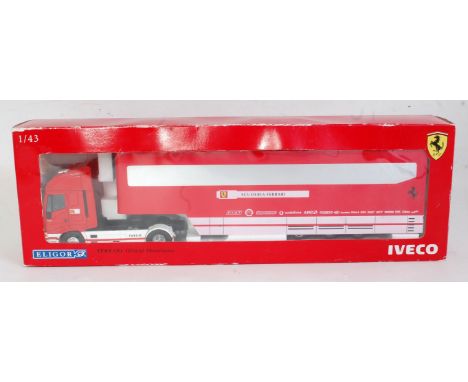 An Eligor 1:43 scale model of a Ferrari Official Motorhome, comprising of Iveco 480 tractor unit with Scuderia Ferrari traile