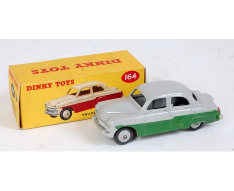 A Dinky Toys No. 164 Vauxhall Cresta saloon comprising grey and green body with grey hubs, in the original correct colour spo