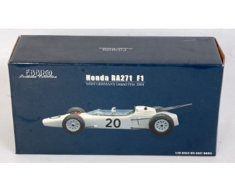 An Ebbro Premium Collection 1:20 scale model of a Honda RA 271 F1 racing car, West German Grand Prix 1964, all housed in the 