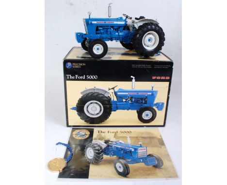 An Ertl Precision Series 1:16 scale model of a Ford 5000 tractor, model No. 13503, comprising blue &amp; grey body with grey 