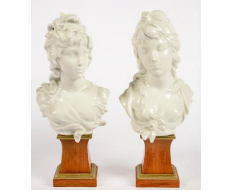 A PAIR OF ROYAL WORCESTER BUSTS OF DAY AND NIGHT, MODELLED BY ARNOLD MACHIN, ON BRASS MOUNTED WALNUT PLINTH, 38CM H, IMPRESSE