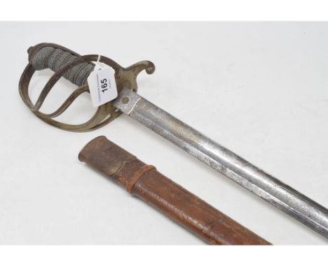 A Gloucester Artillery Volunteers sword, with a wire bound fishskin grip and a leather scabbardReport by RBSome of the platin