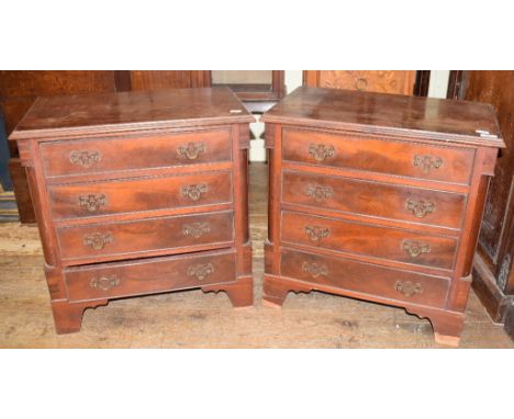 A pair of George III style mahogany bedside chests, of three drawers, on bracket feet, 61 cm wide (2) 