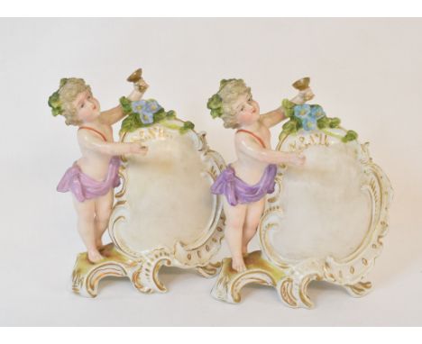 Two German porcelain menu holders, applied putto, 14 cm high, Continental, nodding and other figures and items (2 boxes)Repor